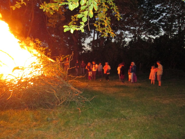 Glowing faces delight while the Ritual Bomb Fire ignites! 